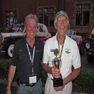 Keith Martin(Sports Car Market) presents Spirit of Motorsports Award to Bob Russell